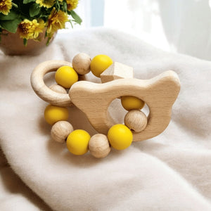 Ourson et perles jaunes