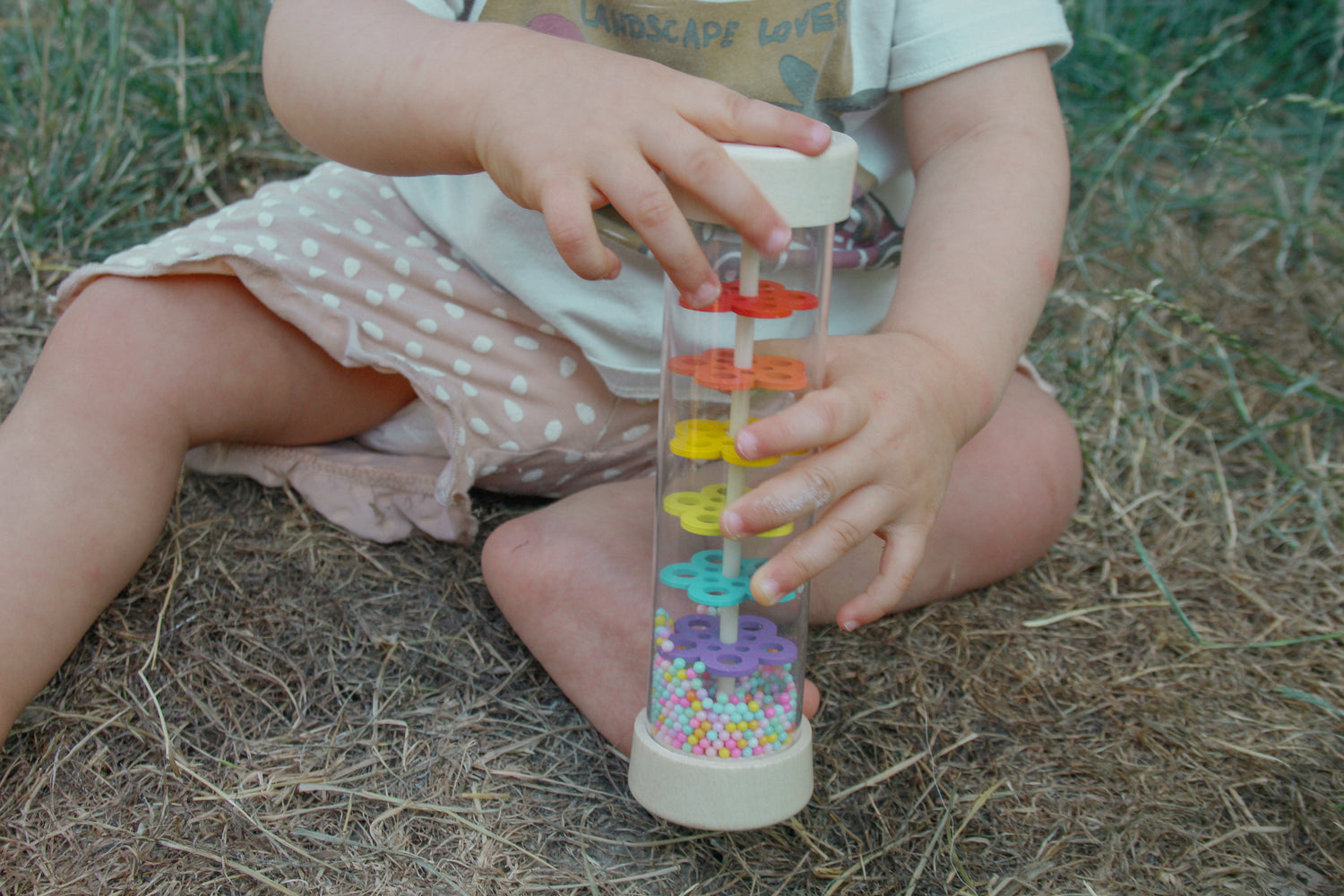 Bâton de pluie sensoriel en bois – Tube à perles colorées pour bébé